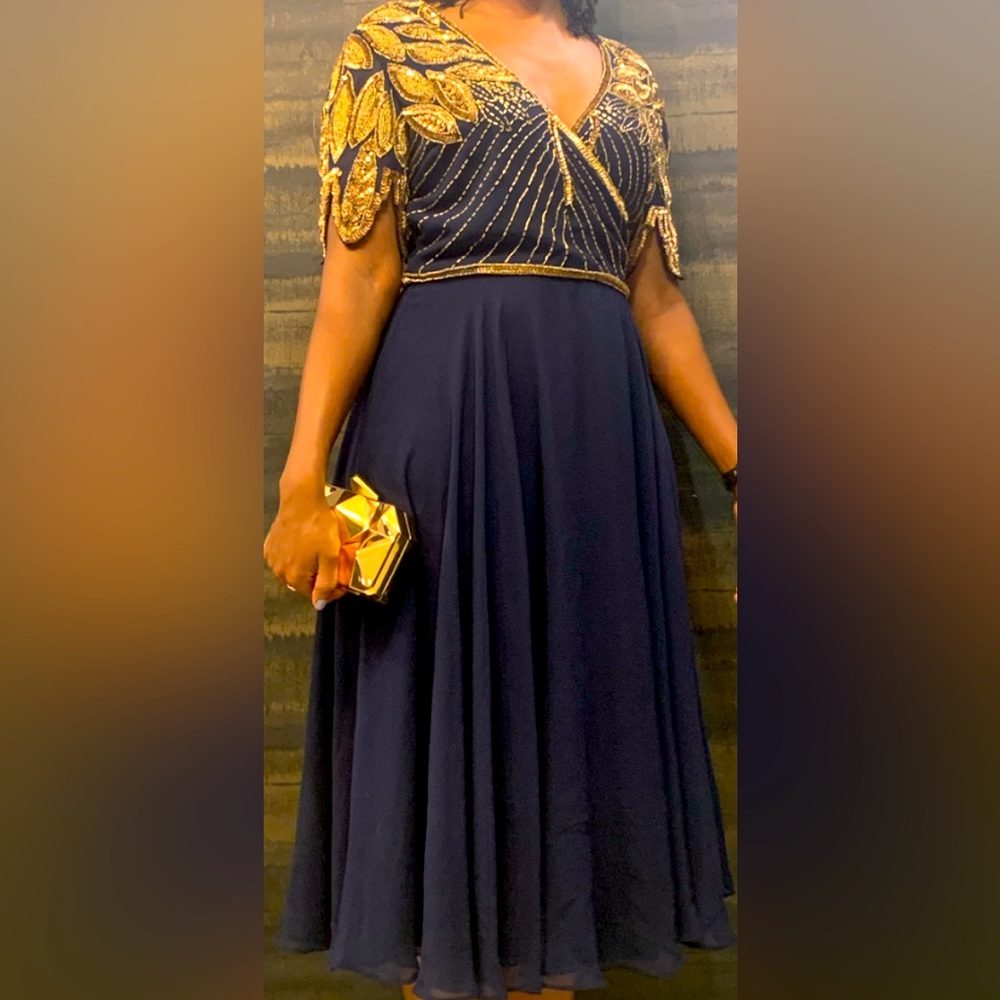 Wedding guest dress, navy blue with gold sequin details on the top. Size 6 US